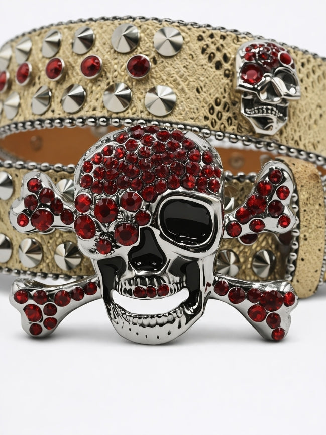Belt with skull design and red gemstones on a white background