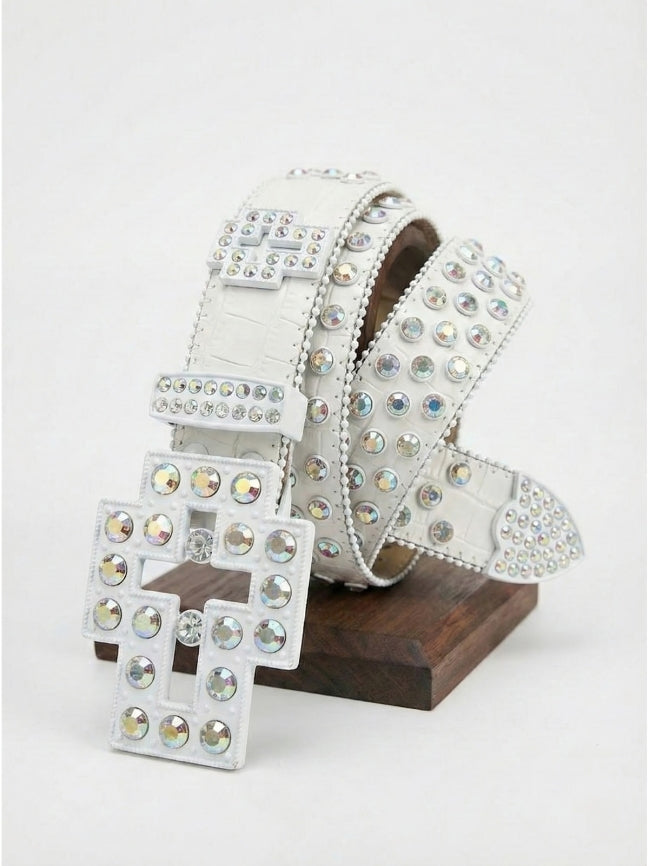 Silver belt with rhinestone embellishments on a wooden stand against a white background