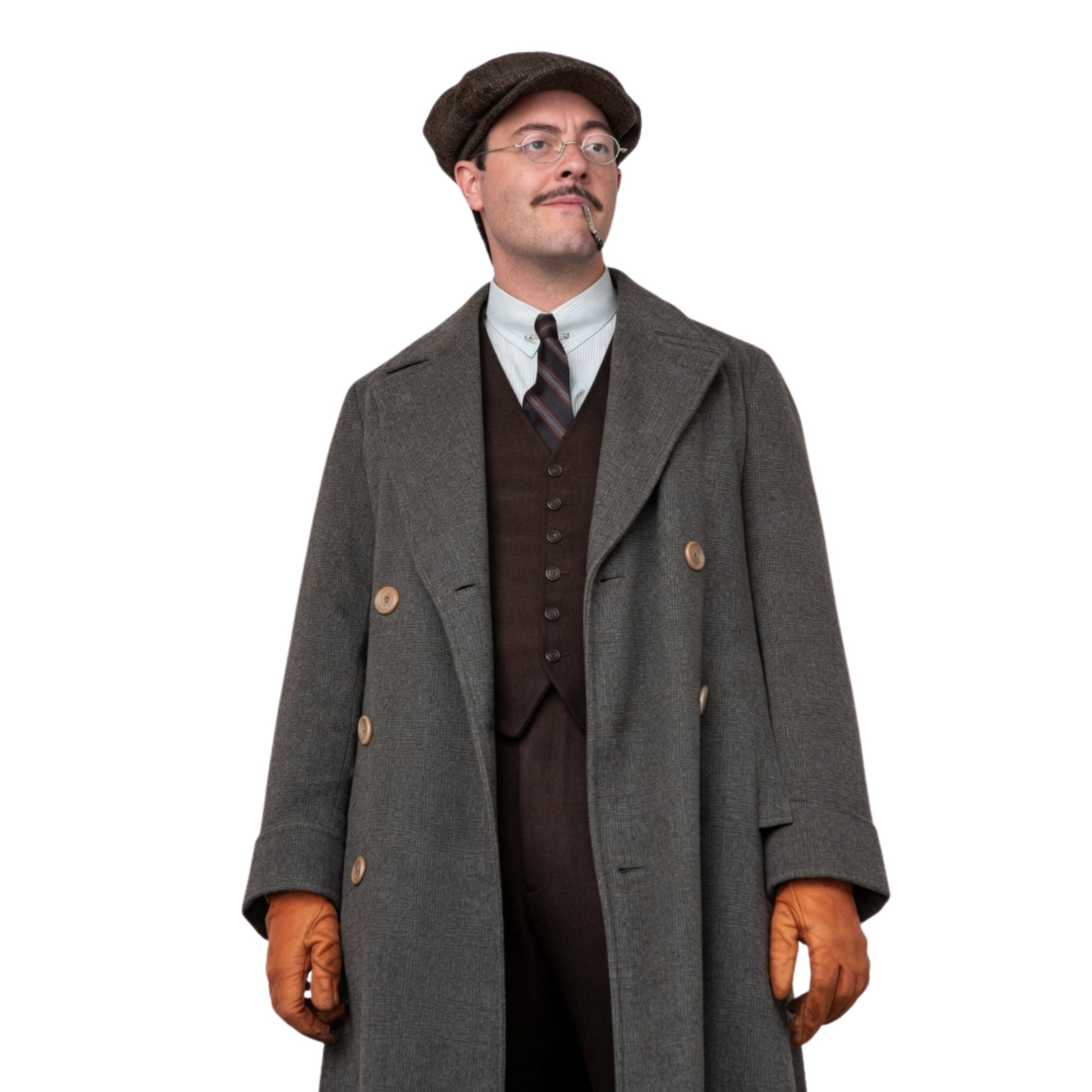 Man wearing a vintage outfit with a long coat, vest, tie, and gloves on a white background