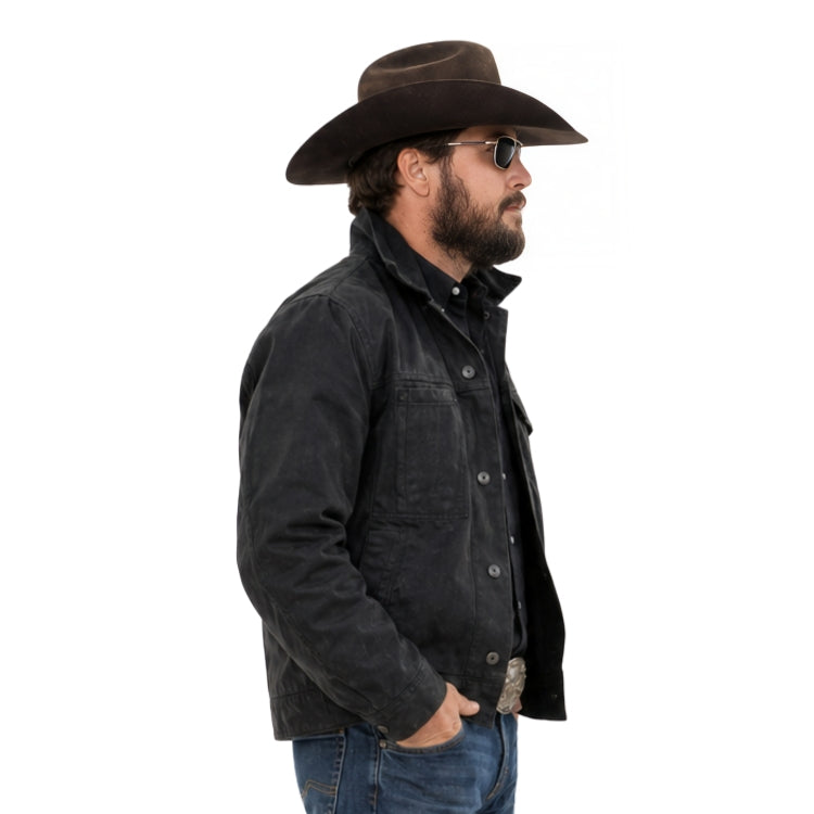 Man wearing a black jacket, jeans, and a brown hat on a white background