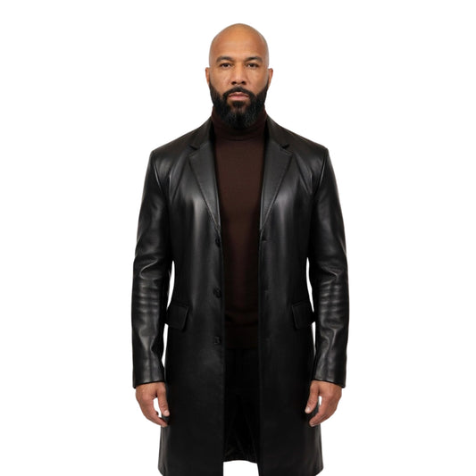 Man wearing a black leather coat on a white background
