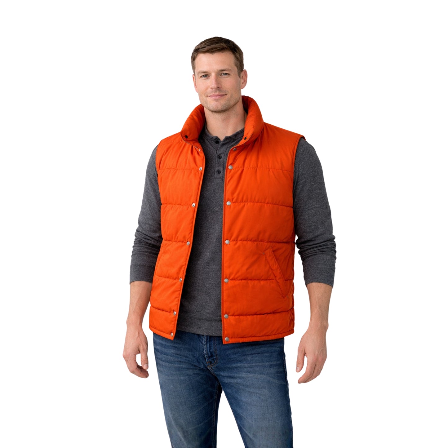 Man wearing an orange puffer vest over a gray shirt on a white background