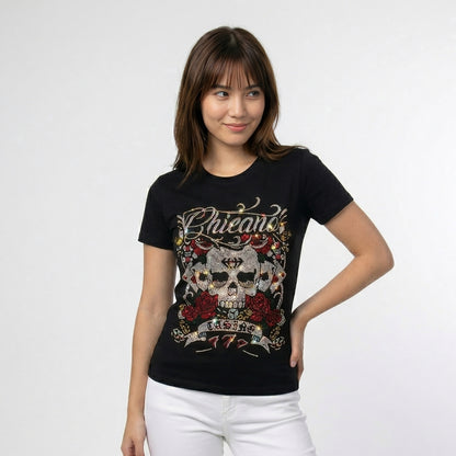 Woman wearing a black t-shirt with a graphic design on a white background