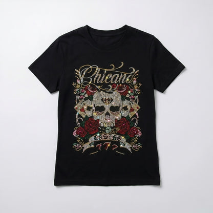 Black t-shirt with a skull and roses design on a white background
