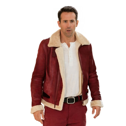 Man wearing a red leather jacket with beige fur lining on a white background