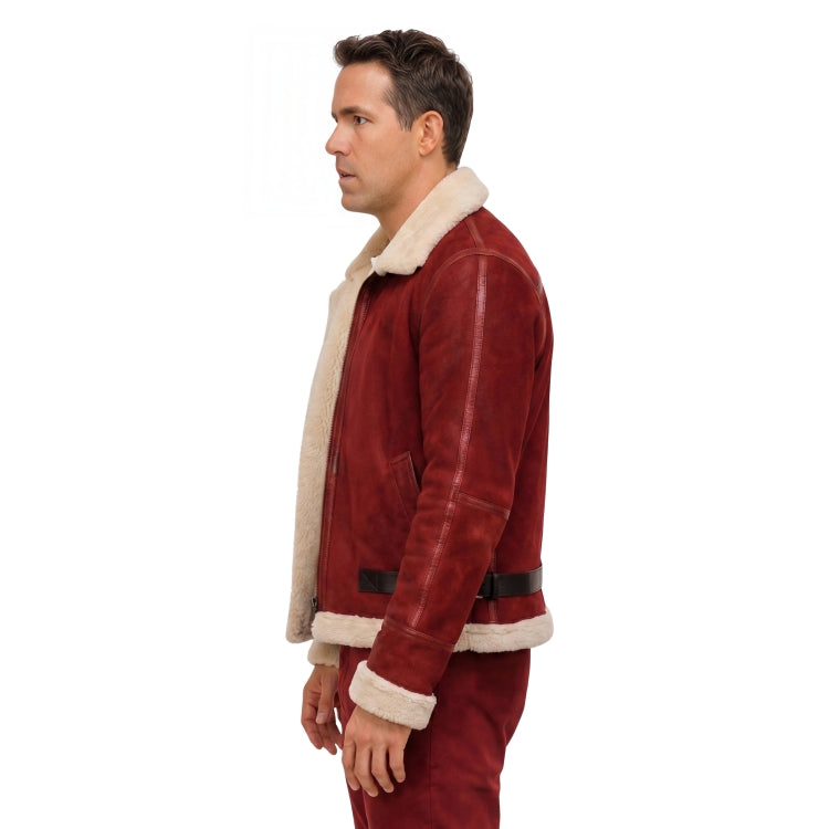 Man wearing a red suede jacket with white fur lining on a white background