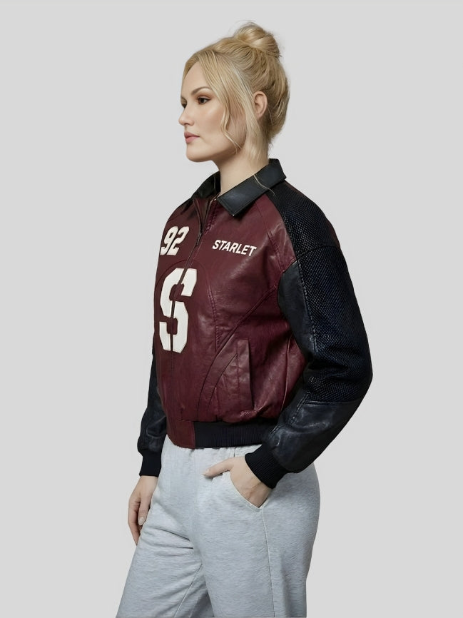 Person wearing a maroon and black bomber jacket with 'Starlet' branding on a light gray background