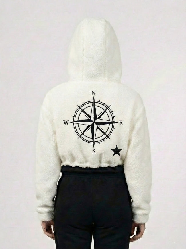 White hoodie with a compass design on the back against a white background