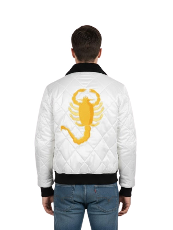 White quilted jacket with yellow scorpion design on the back, worn by a person.