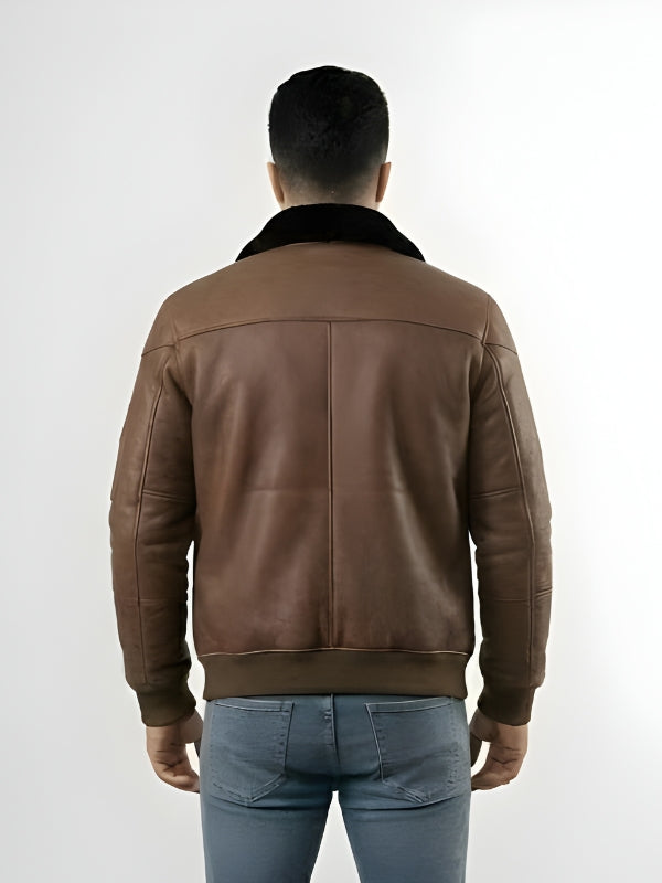 Man wearing a brown leather jacket on a white background