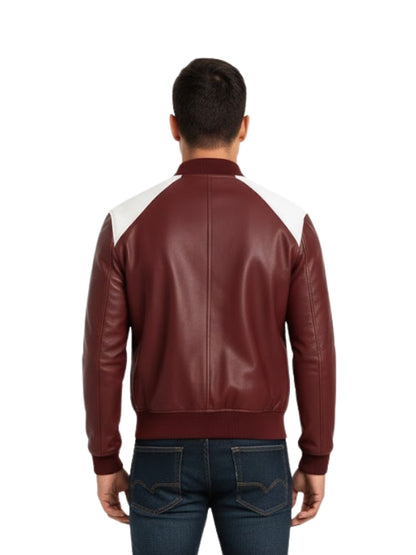 Man wearing a maroon leather jacket with white sleeves on a white background
