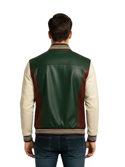 Man wearing a green, red, and beige varsity jacket on a white background