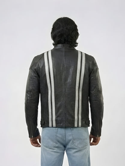 Person wearing a black leather jacket with white stripes on a white background