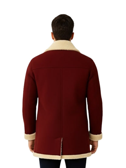 Maroon coat with beige trim worn by a person on a white background