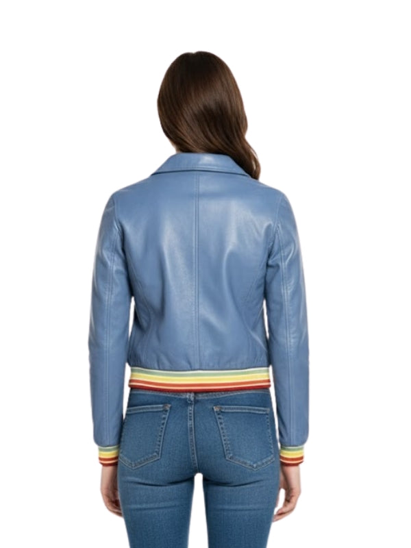 Blue leather jacket with colorful cuffs worn by a person on a white background