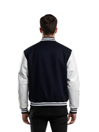 Person wearing a navy and white varsity jacket on a white background
