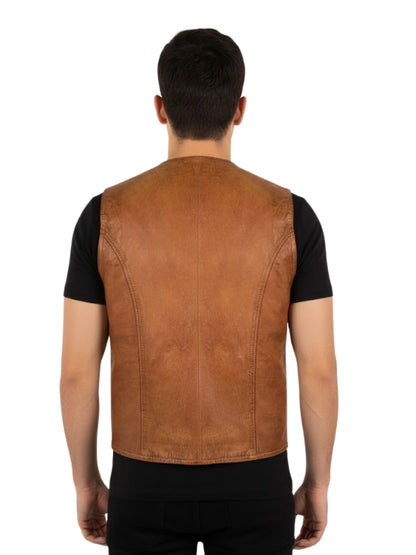 Man wearing a brown leather vest over a black shirt on a white background