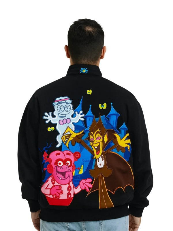 Person wearing a black jacket with colorful cartoon characters on the back against a white background