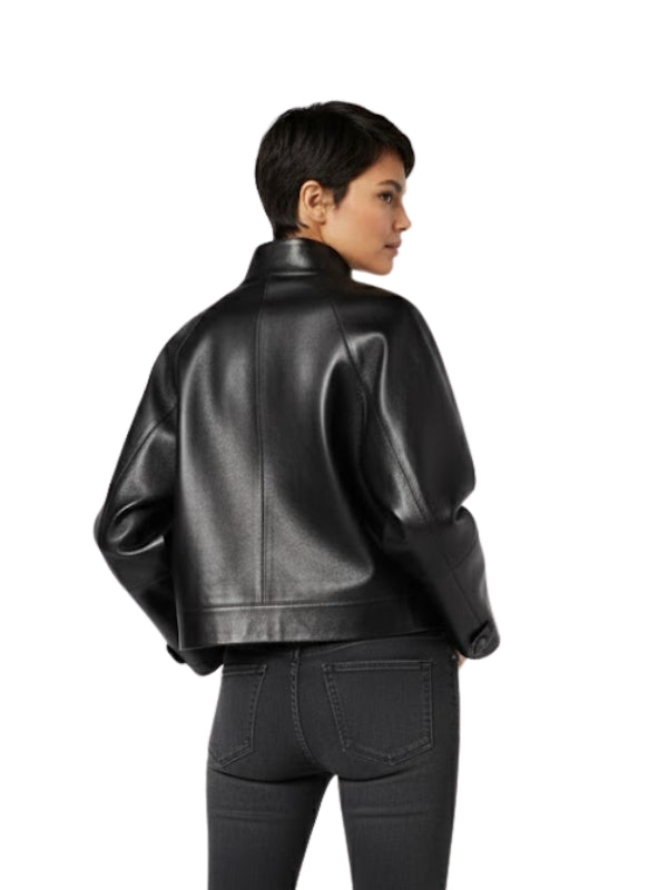 Person wearing a black leather jacket on a white background