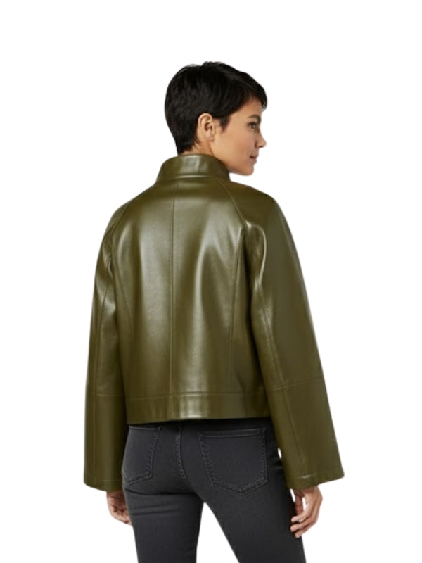Person wearing an olive green leather jacket on a white background