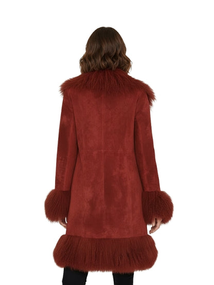 Red fur-trimmed coat worn by a person on a white background