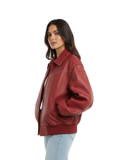 Woman wearing a red leather jacket on a white background