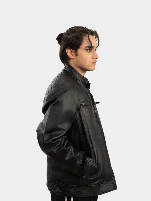 Person wearing a black leather jacket on a white background