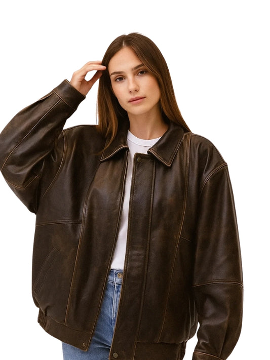 Woman wearing a brown leather jacket on a white background