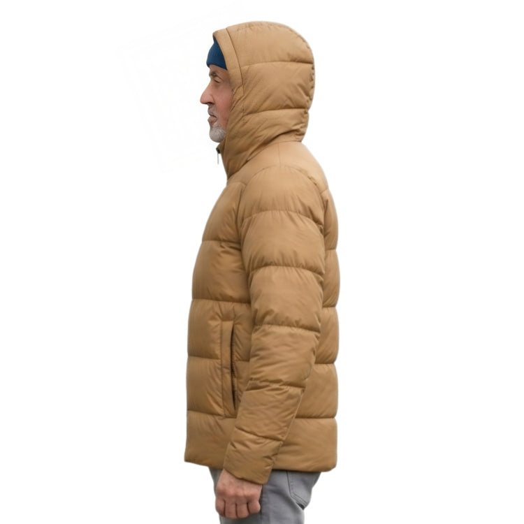Person wearing a tan puffer jacket on a white background