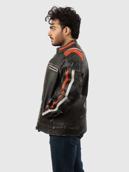 Man wearing a black leather jacket with red and white accents on a light gray background