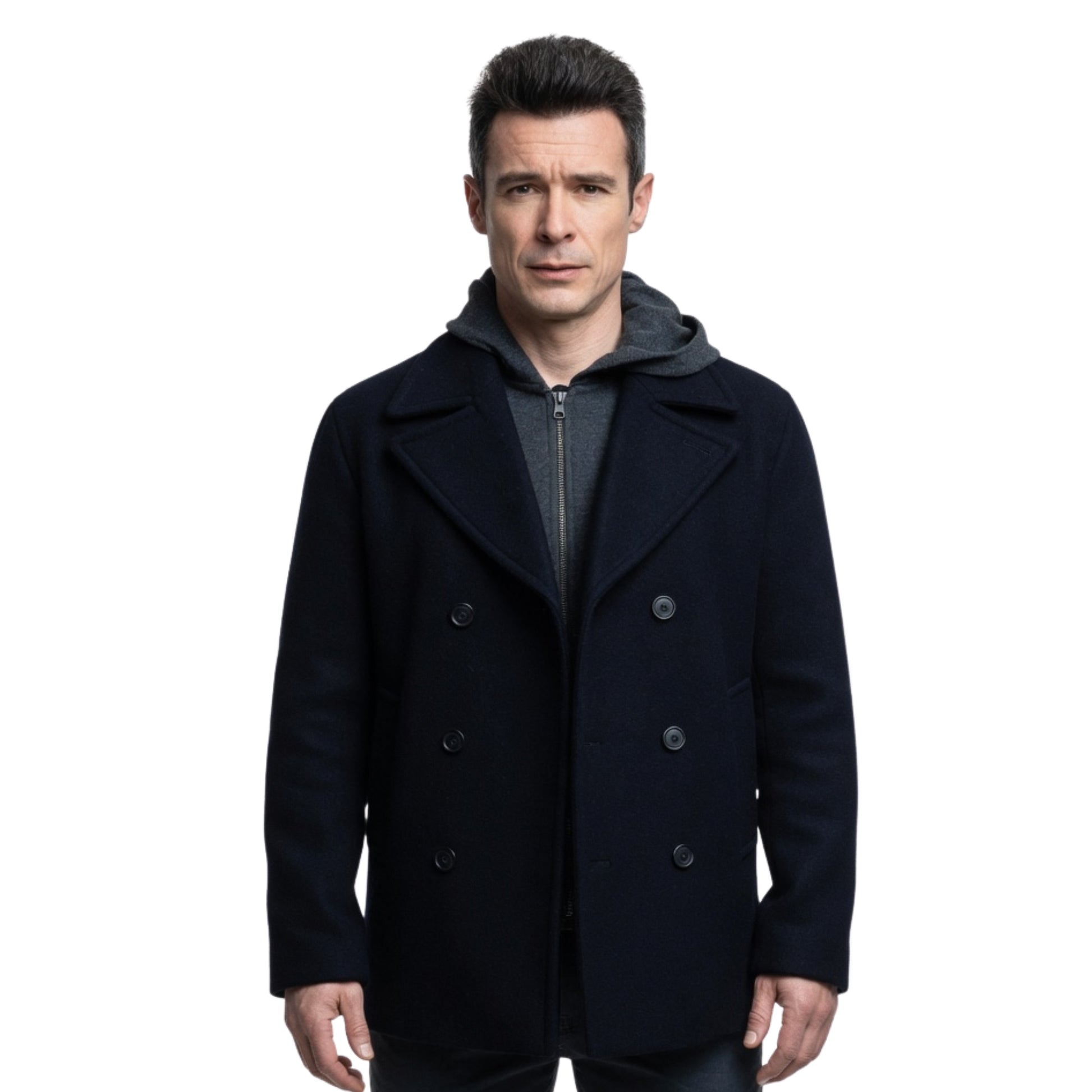 Man wearing a dark blue peacoat on a white background