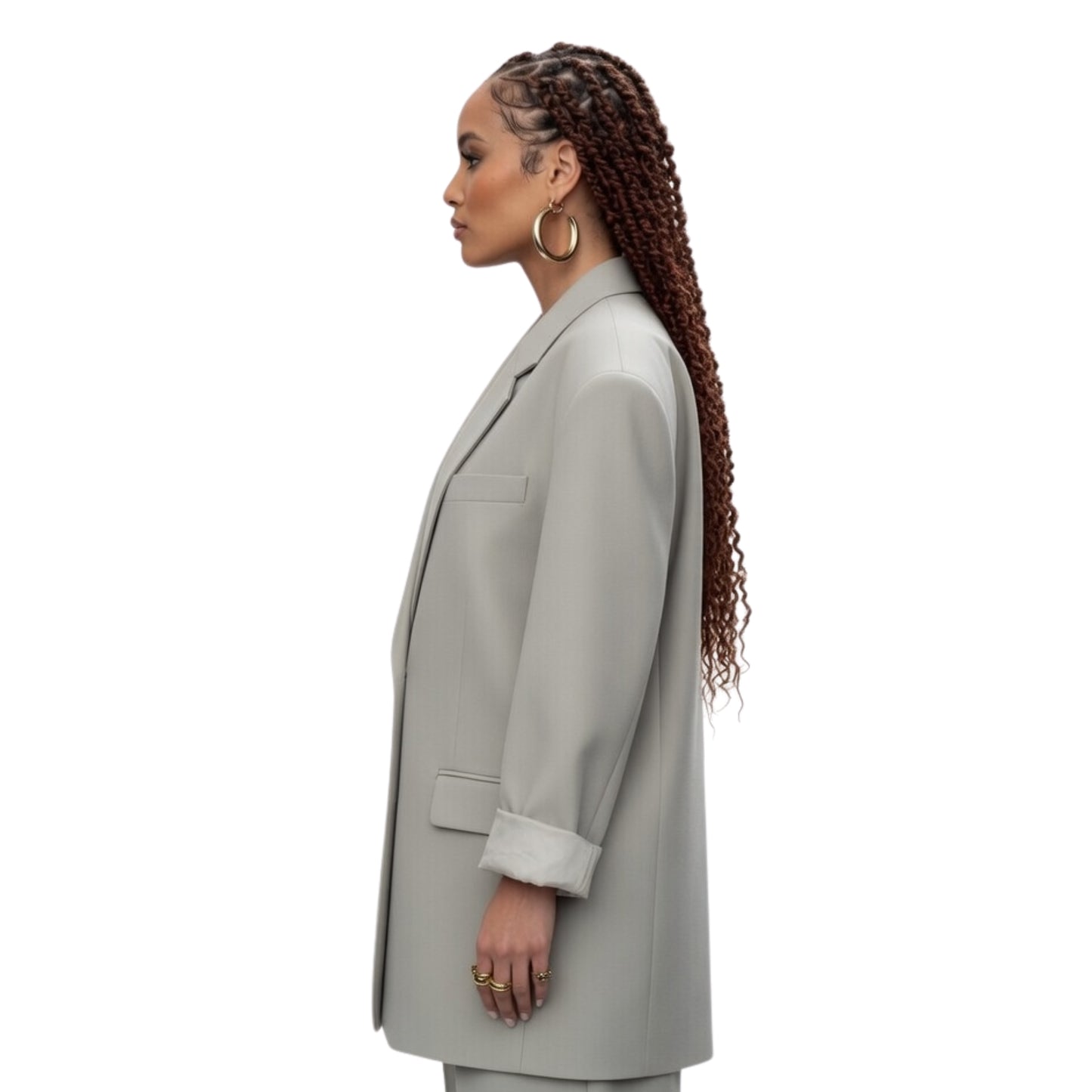 Woman wearing a light gray coat on a white background