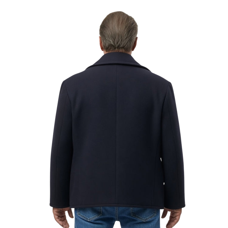 Person wearing a pink coat from behind on a white background