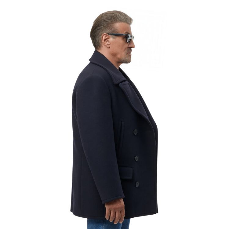 Man wearing a dark coat and sunglasses on a white background