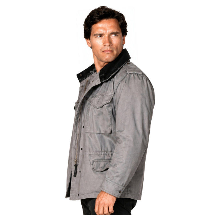 Man wearing a gray jacket with black fur trim on a white background