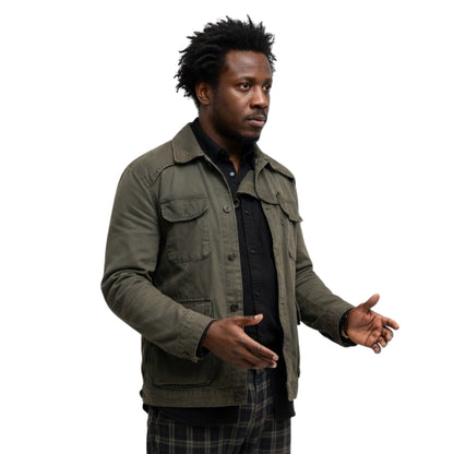 Man wearing a green jacket on a white background
