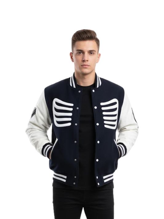 Man wearing a navy and white varsity jacket with skeleton design on a white background