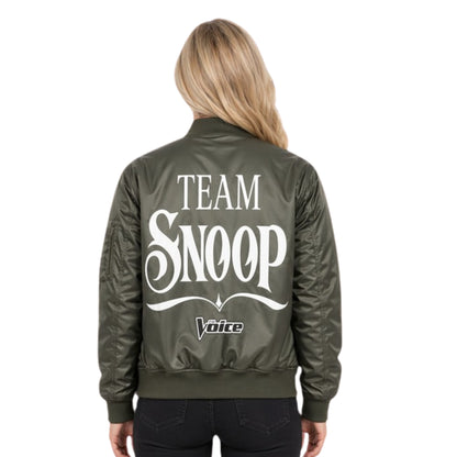Person wearing a green jacket with 'Team Snoop' text on the back, on a white background