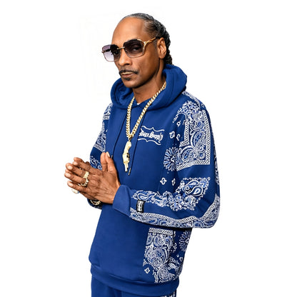Person wearing a blue hoodie with white patterns on a white background