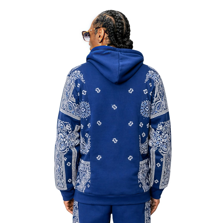 Person wearing a blue hoodie with white bandana patterns on a white background