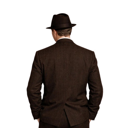 Man wearing a brown suit and hat from behind on a white background
