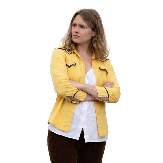 Woman wearing a yellow jacket with black accents on a white background
