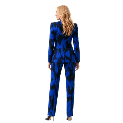 Woman wearing a blue and black patterned suit on a white background