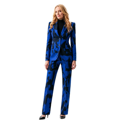 Woman wearing a blue patterned suit on a white background