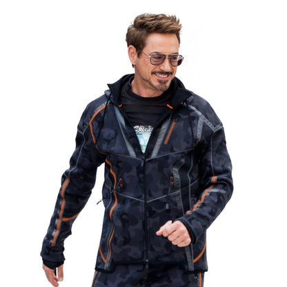 Man wearing a dark camouflage jacket with orange accents on a white background