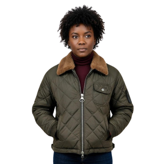 Person wearing a green quilted jacket with a brown fur collar on a white background