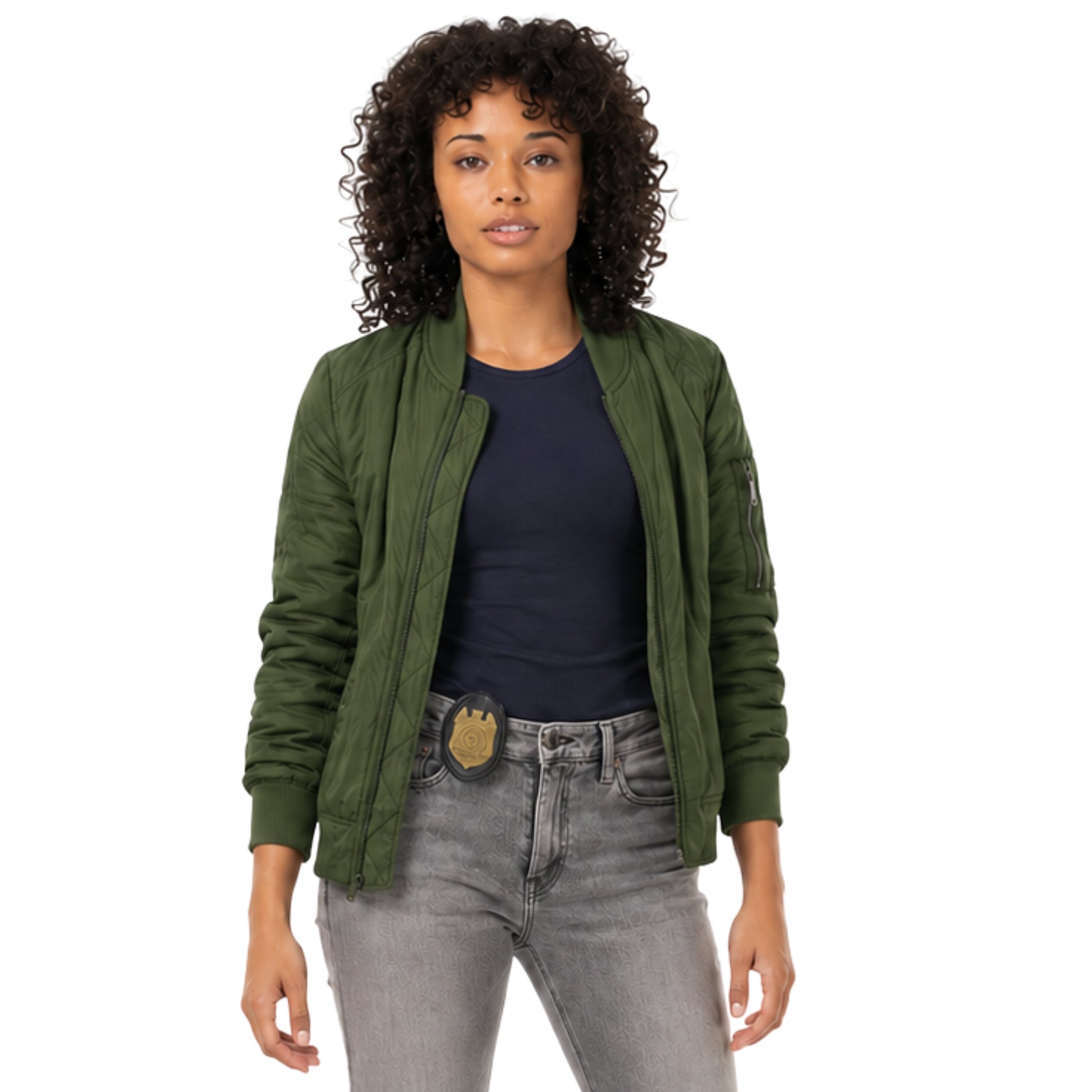Woman wearing a green jacket, black shirt, and gray jeans on a white background