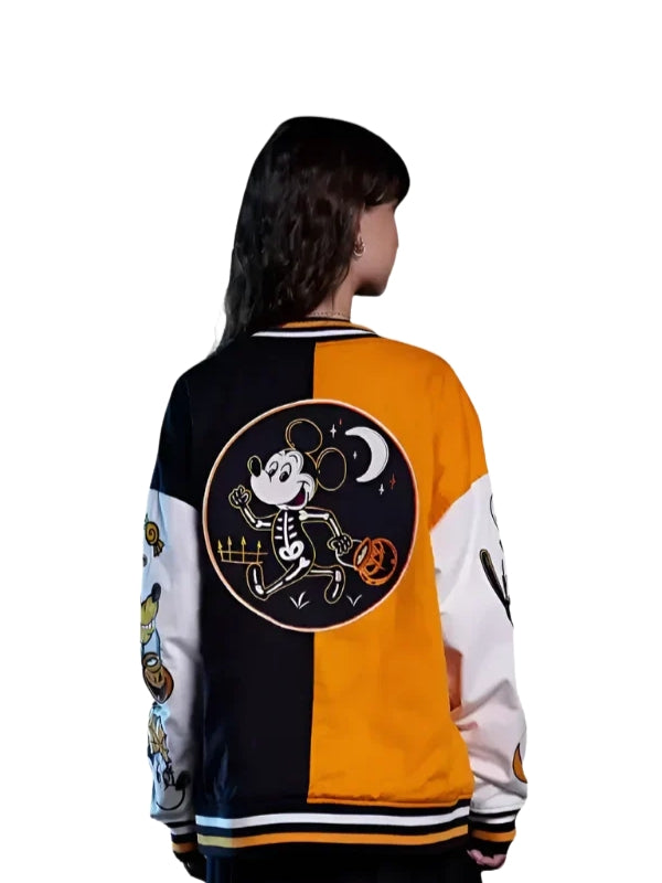 Person wearing a colorful jacket with a cartoon character design on the back