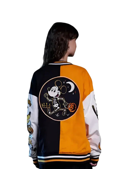 Person wearing a colorful jacket with a cartoon character design on the back