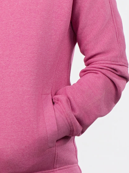 Close-up of a pink hoodie with a white background